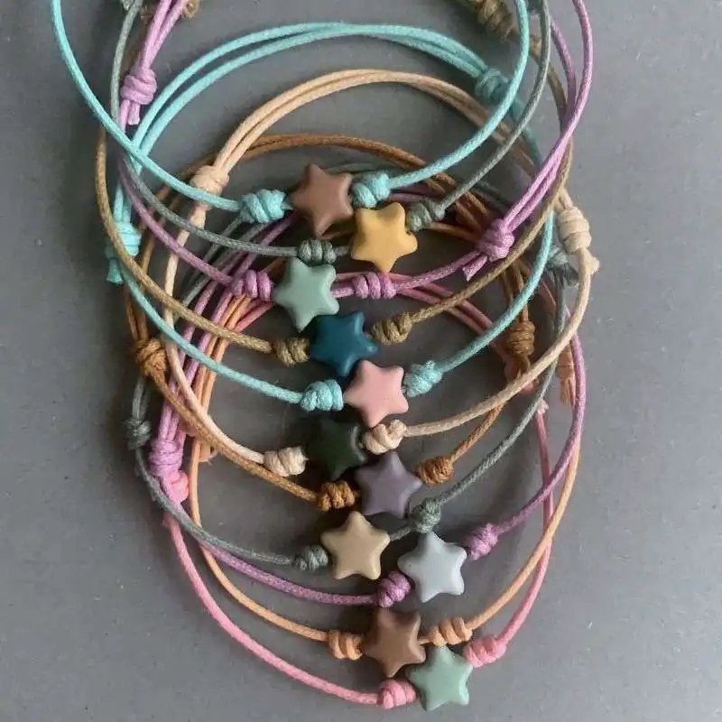 PULSERAS CON ESTRELLA Y CON CORDÓN DE ALGODÓN ENCERADO