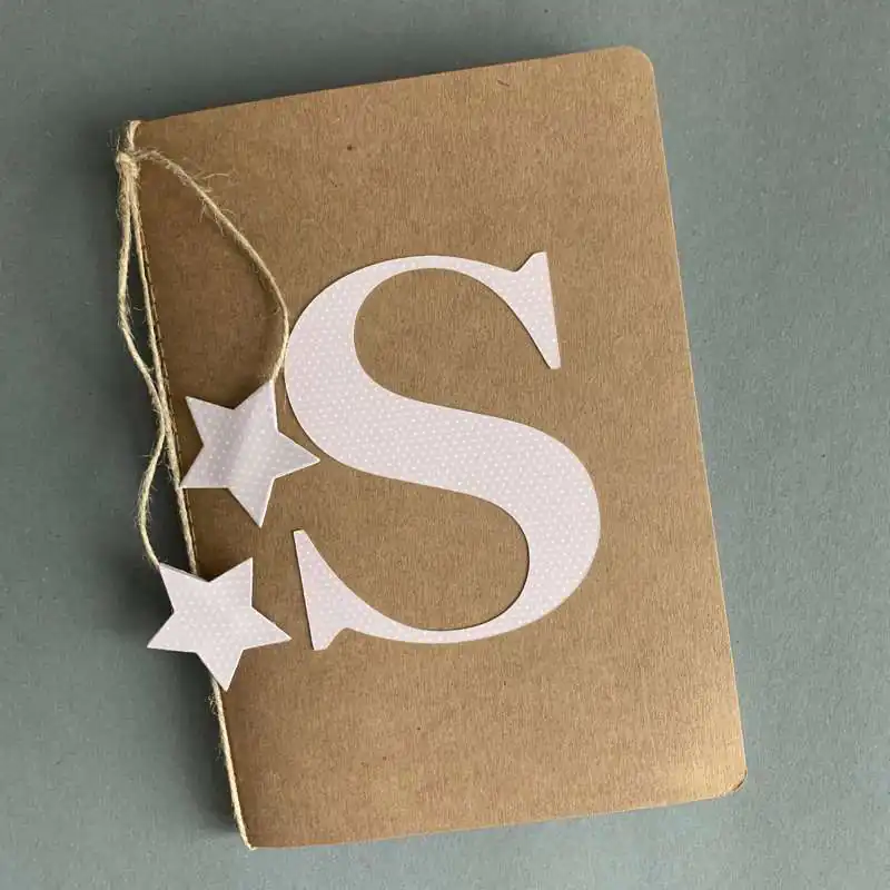 CUADERNO CON INCIAL